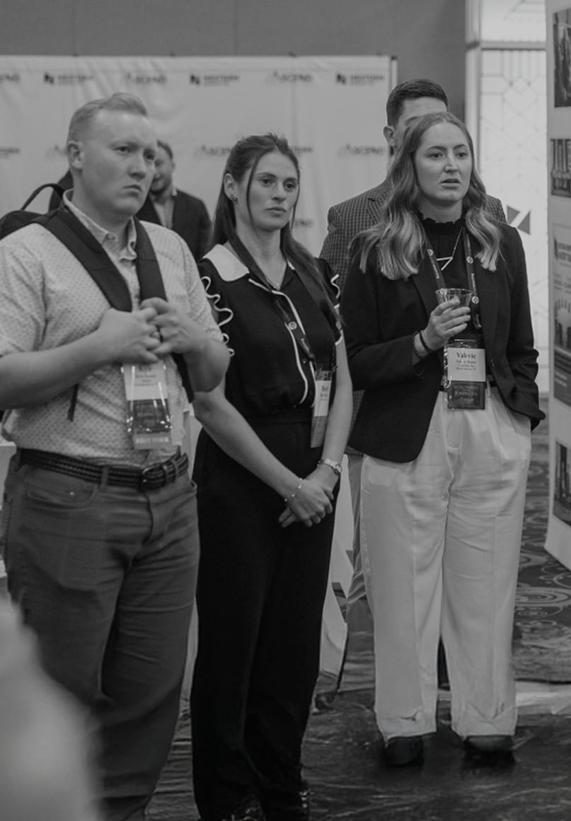 Attendees listening at NextGen Attend Ascend conference, promoting professional development and networking in the education technology industry.